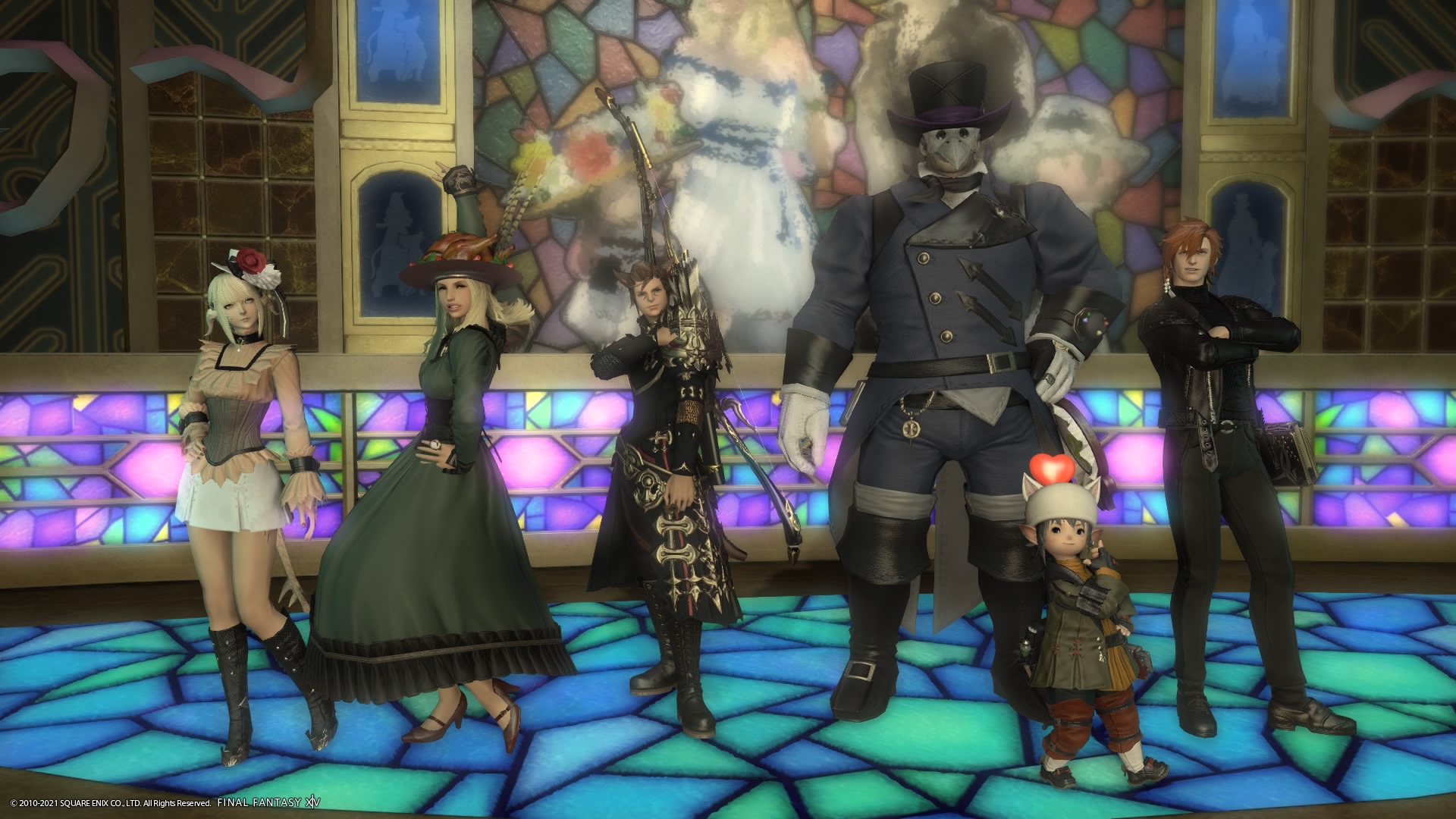 A group of six diverse characters from Final Fantasy XIV posing in front of a colorful stained-glass background. Each character sports a unique and stylish outfit, ranging from elegant and historical-inspired dresses to gothic and steampunk ensembles. The characters vary in size, with a tall masked figure in a top hat and a small Lalafell wearing a heart-adorned hat.